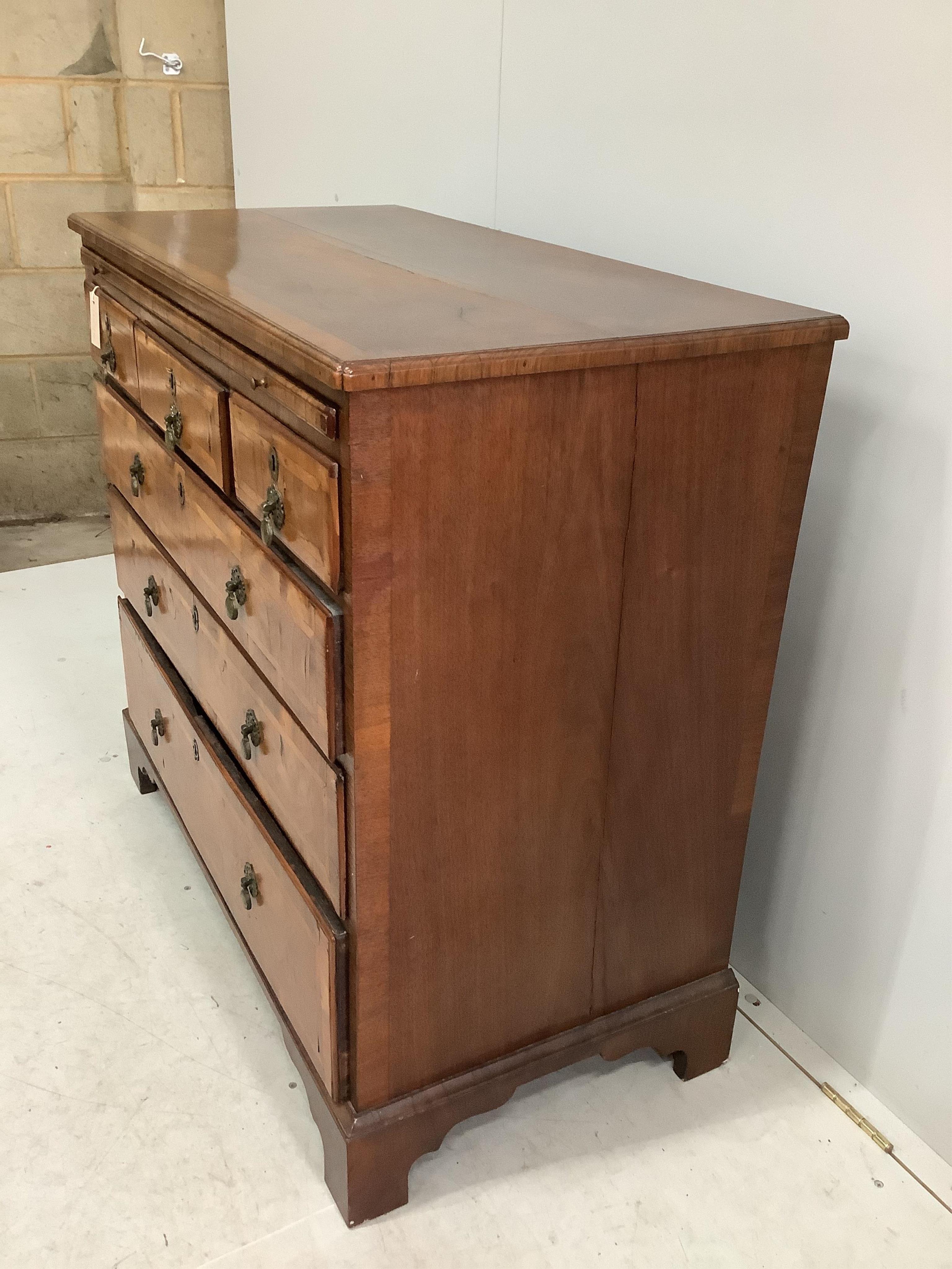 A George II walnut and isometric banded chest of drawers, width 99cm, depth 51cm, height 94cm. Condition - fair